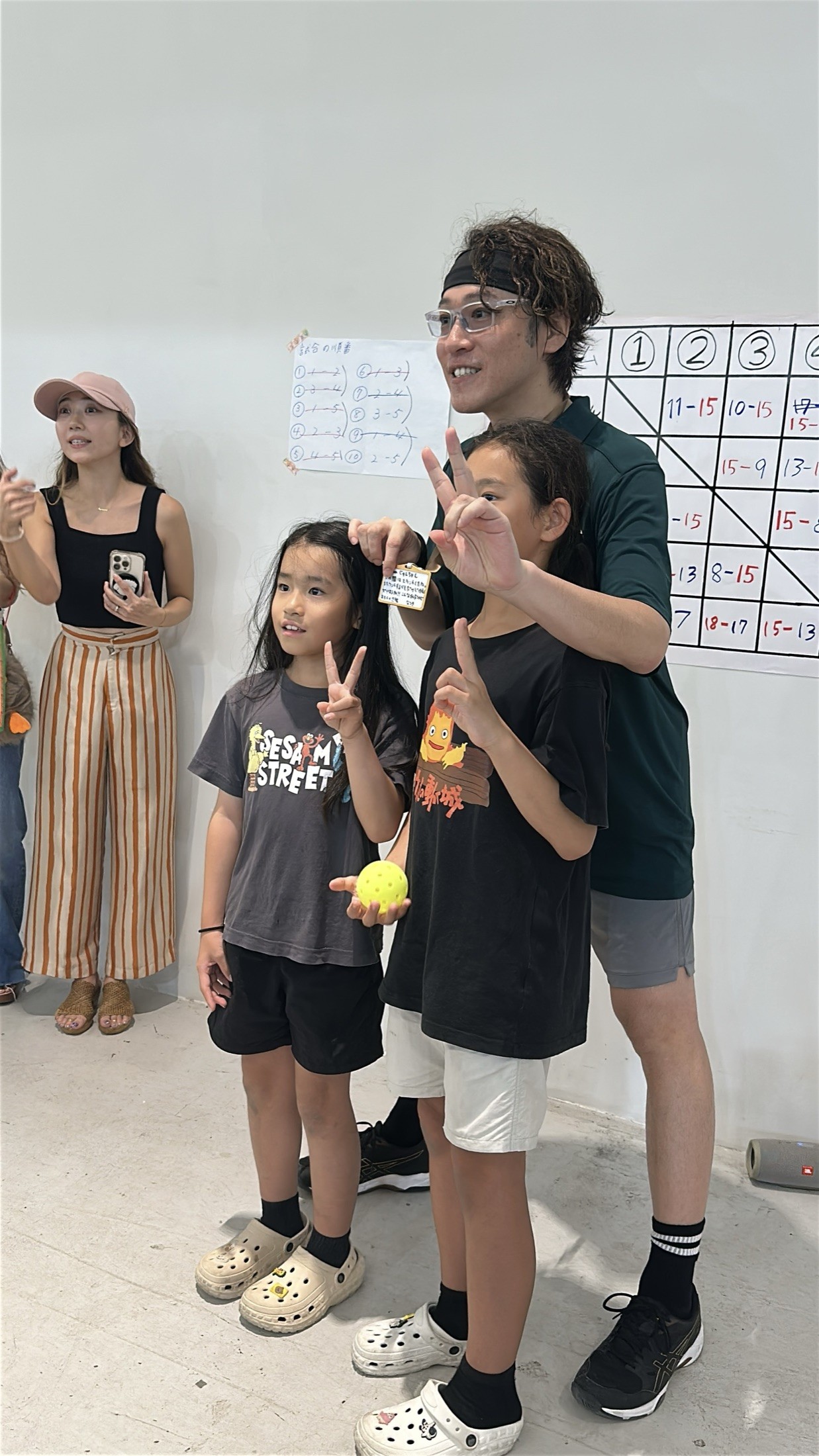 表彰シーンの親子写真